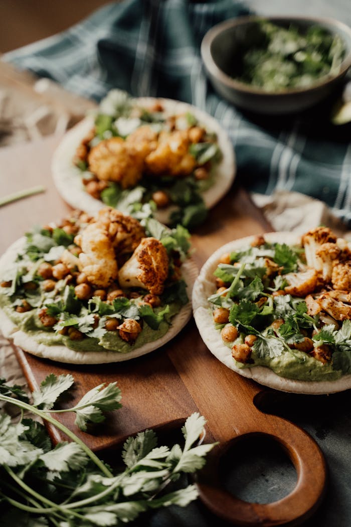 Services Savor delicious vegan cauliflower and chickpea flatbreads, perfect for a healthy meal.